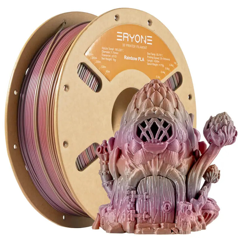 A spool of ERYONE Rainbow PLA 3D printer filament with a Steampunk corrosion color change effect, alongside a 3D printed model resembling a rustic, metal-looking structure.